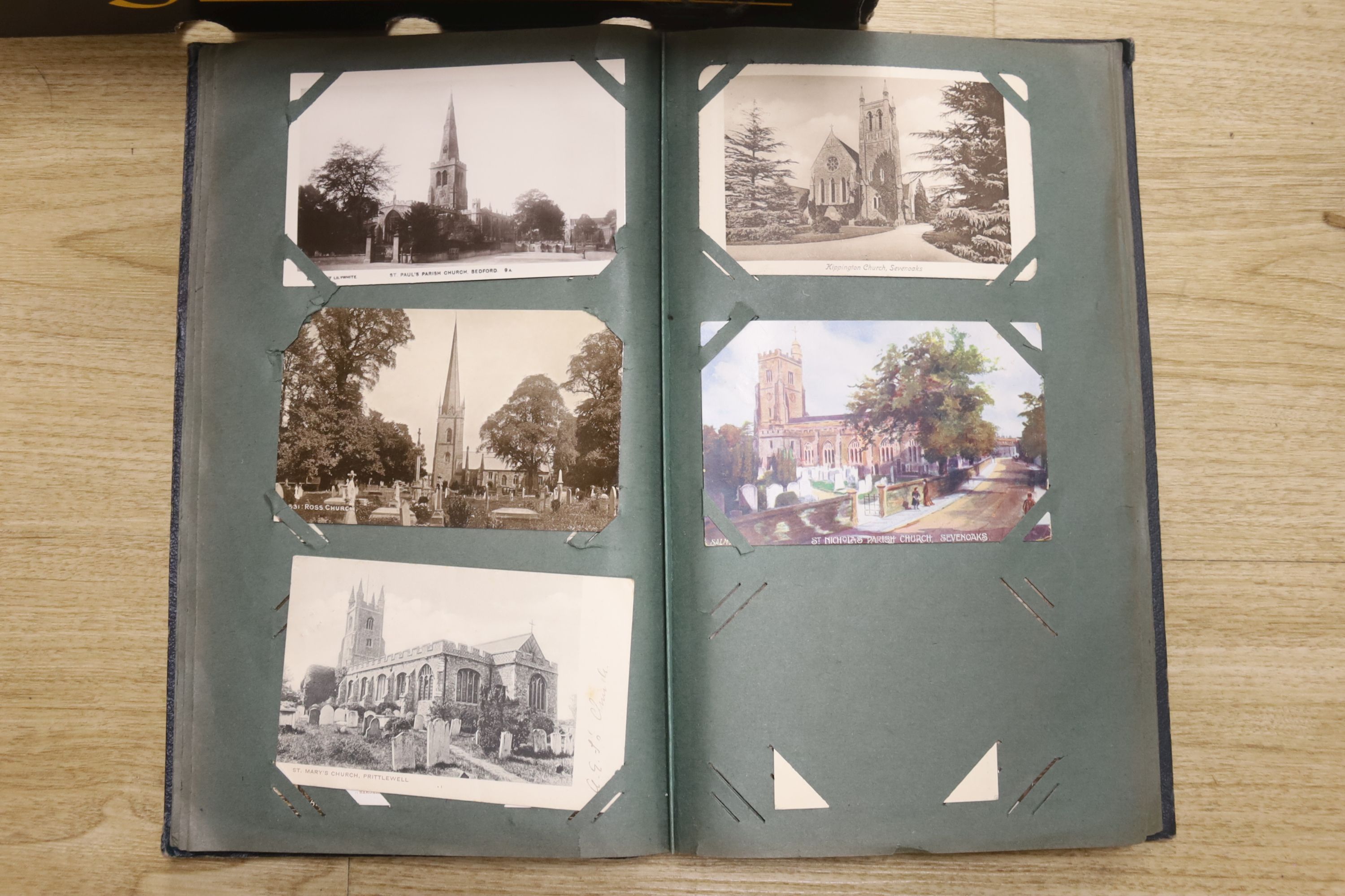 Three photograph albums and loose photos plus three postcard albums and a quantity of European currency